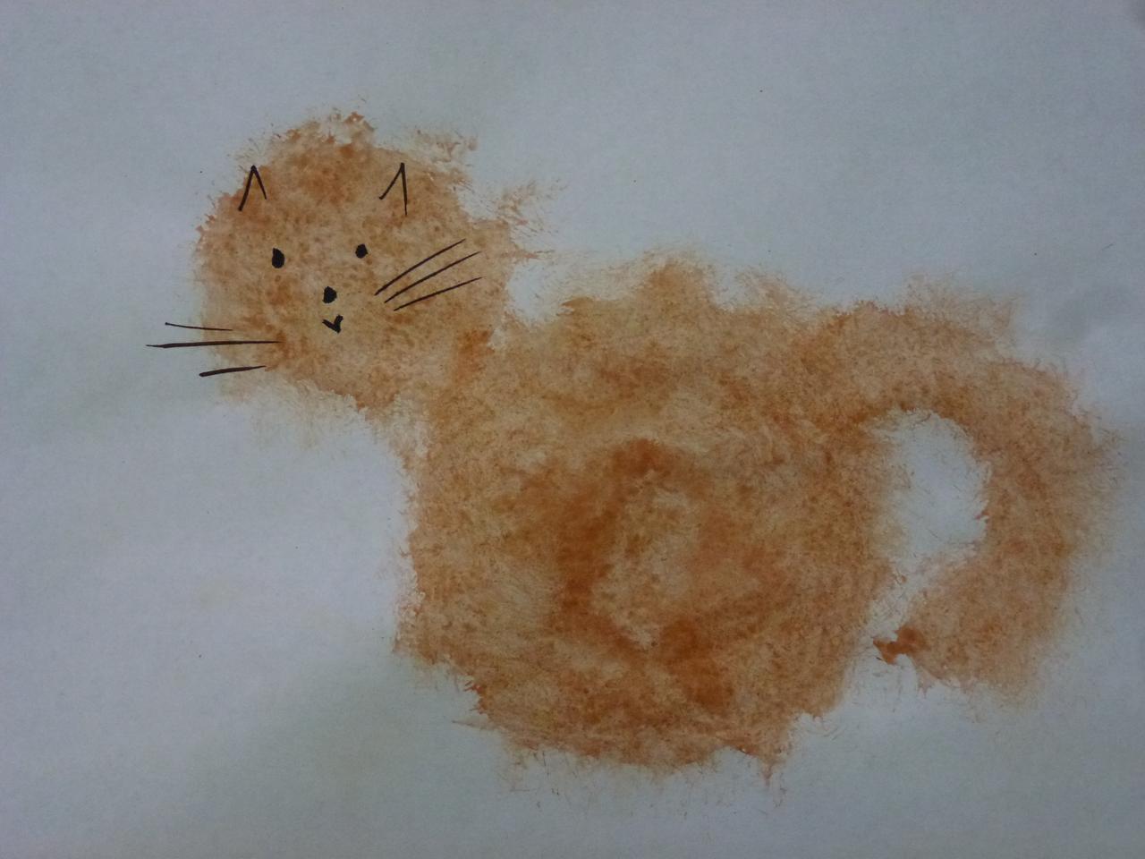 Пушистый котенок Рыжик